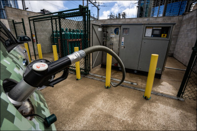 A hydrogen car gets a fill up at GM hydrogen service in Kakaako.