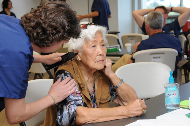 Maj. Ruthann Murphy, a registered nurse with the 193rd Special Operations Wing's Medical Group out of Middletown, Pa., tests the hearing of a patient. Murphy and other members of the 193rd Medical Group provided free health screenings atthe Hawaii County Office of Aging in Hilo, Hawaii, on June 14th, 2010. Members of the 193rd Medical Group are in Hilo for Medical Innovative Readiness Training.