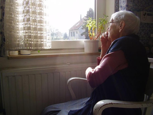 Elderly woman window