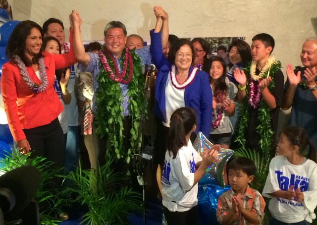 Then state Rep. Mark Takai delivered his victory speech in 2014 after winning the Democratic nomination for the 1st Congressional District. He's shown here with U.S. Sen. Mazie Hirono, on his right, and U.S. Rep. Tulsi Gabbard, on his left, and his family in the courtyard of Ferguson's Irish Pub in downtown Honolulu.