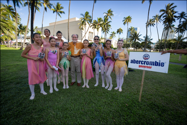 Gov. Neil Abercrombie poses with young ballerinas in front of Blaisdell Center before holding his campaign last rally of the Primary season on August 5, 2014.