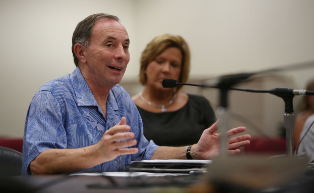 Jeff Kissell, Executive Director of the Hawaii Health Connector speaks to lawmakers at hearing at the Capitol. 29 dec 2014. photograph Cory Lum/Civil Beat