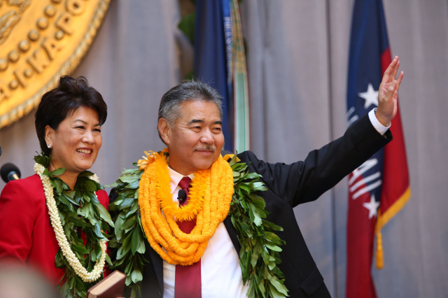 Governor David Ige and wife Dawn wave after ige took the oath of office.  1 dec. 2014. photo Cory Lum