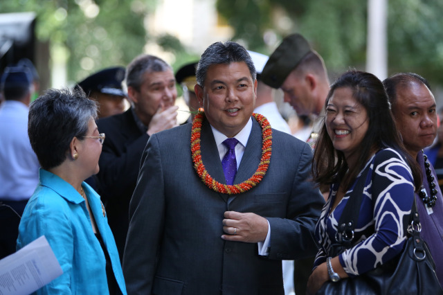 Senator Mark Takai with wife Sami Takai at Governor Ige's inauguration ceremony held at the Hawaii Capitol rotunda. 1 dec 2014. photograph Cory Lum