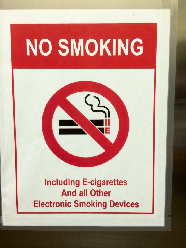 A sign of the times in a state Capitol elevator.