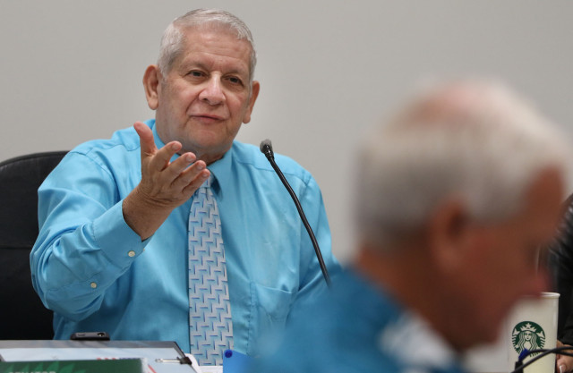 Senator Sam Slom yells at Mayor Caldwell during senate ways and means hearing. 7 april 2015. photograph by Cory Lum/Civil Beat