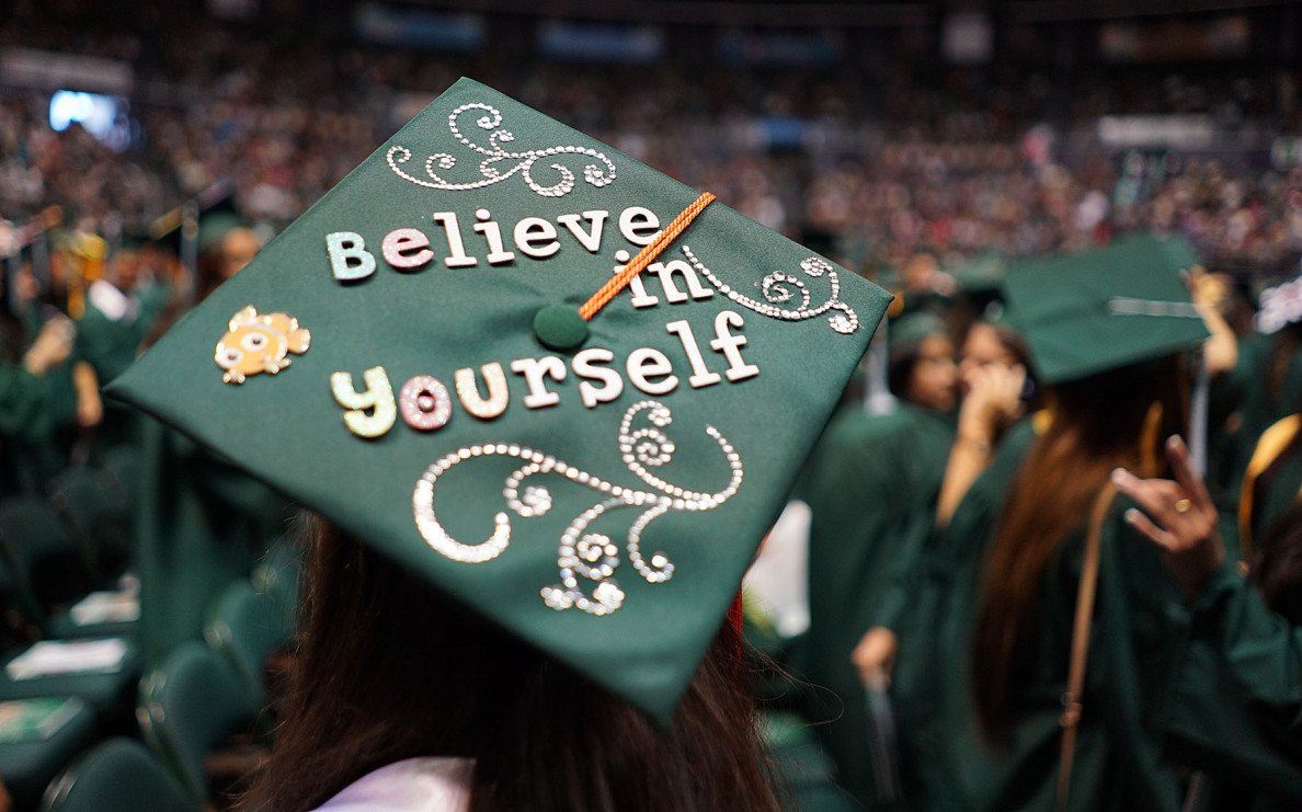 ‘Believe in Yourself’. UH Graduation ceremony. 16 may 2015. photograph by Cory Lum/Civil Beat