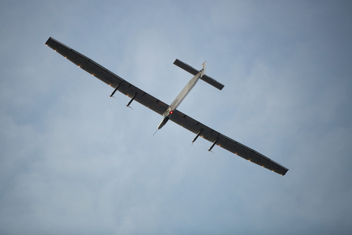 Solar Impulse 2 approaches Kalaeloa Airport after record 5 day flight over Pacific Ocean from Nagoya, Japan.  Andre Borschberg flew Solar Impulse 2  across the Pacific as part of that team's effort at circumnavigating the globe in a solar-powered craft.  Solar Impulse 2 arrives at Kalaeloa Airport, Kapolei . Hawaii.  3 july 2015. photograph Cory Lum/Civil Beat