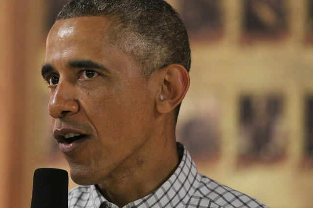 2014 dec. President Barack Obama speaks to military dependents. photograph Cory Lum/Civil Beat