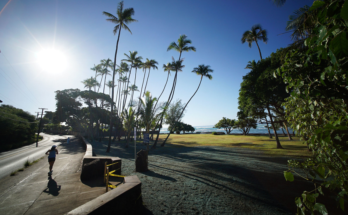Jogger runs up Diamond Head road near the entrance to Leahi Park. 23 oct 2015. photograph Cory Lum/Civil Beat