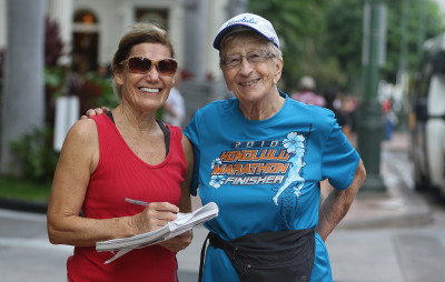 Denby Fawcett, left, takes notes from her visit with Gladys Burrill.