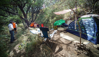 Tents found along the slopes of Diamond Head on outing with Denby's story.