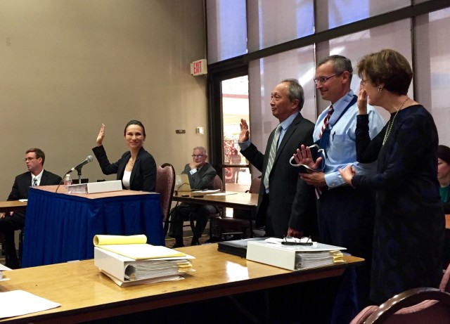 Hawaii Gas President and CEO Alicia Moy was questioned by a NextEra lawyer at regulatory hearings Tuesday about her own company's regulatory experience when it was last sold in 2006.