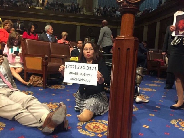 U.S. Rep. Tammy Duckworth takes part Wednesday in the House sit in, aimed at forcing a vote on gun reform legislation. 