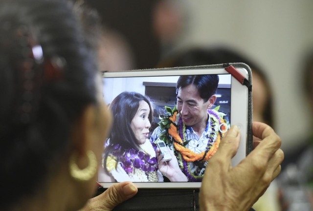 Charles Djou stands with his wife Stacey during the celebration party for his Honolulu Mayor election Saturday, August 13, 2016. (Civil Beat photo by Ronen Zilberman)