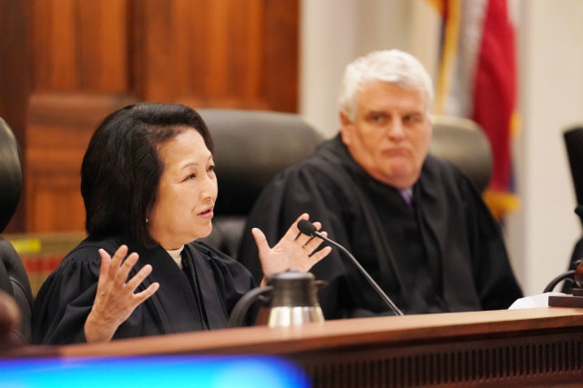 Left, Associate Justice Paula Nakayama raises questions during Civil Beat case with right,Chief Justice Mark Recktenwald, looking on. 1 june 2017