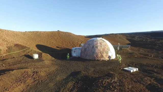 This 2017 photo released by the University of Hawaii shows crew members walking around the university’s Hawaii Space Exploration Analog and Simulation (HI-SEAS) on Mauna Loa volcano, Big Island, Hawaii. After eight months of living in isolation on a remote Hawaii volcano, six NASA-backed space psychology research subjects will emerge from their Mars-like habitat on Sunday, Sept. 17, 2017. The participants are in a study designed to better understand the psychological impacts of a long-term manned mission to space on astronauts. NASA hopes to send humans to Mars by the 2030s. (University of Hawaii via AP)